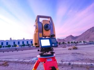 Theodolite used in commercial land surveying services to measure boundaries, improvements, and site features on a commercial property.