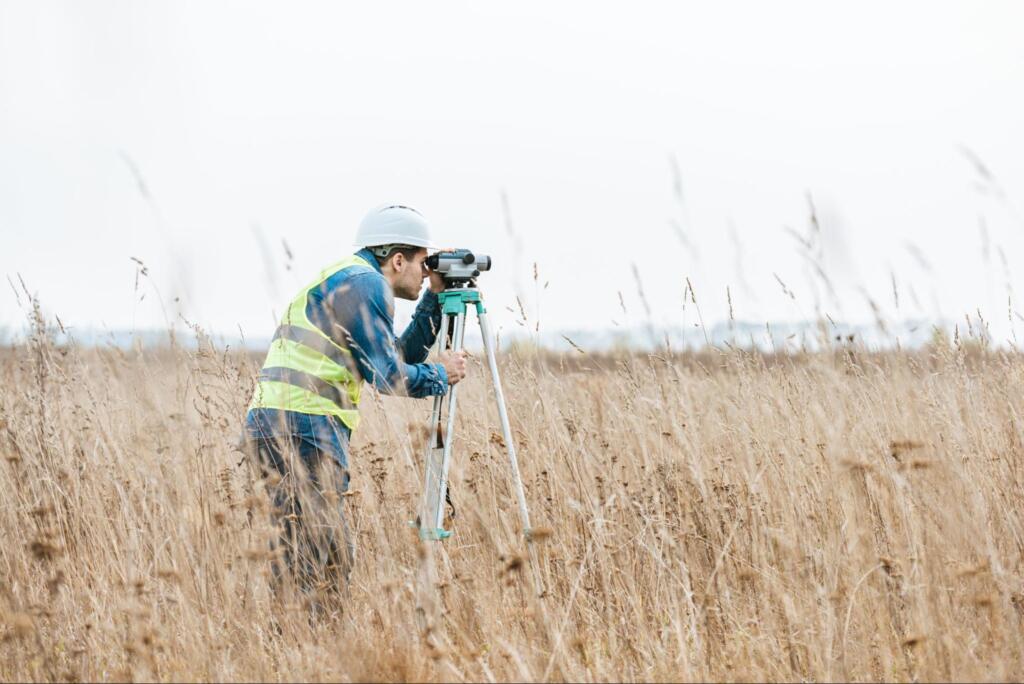 man providing professional land surveying services