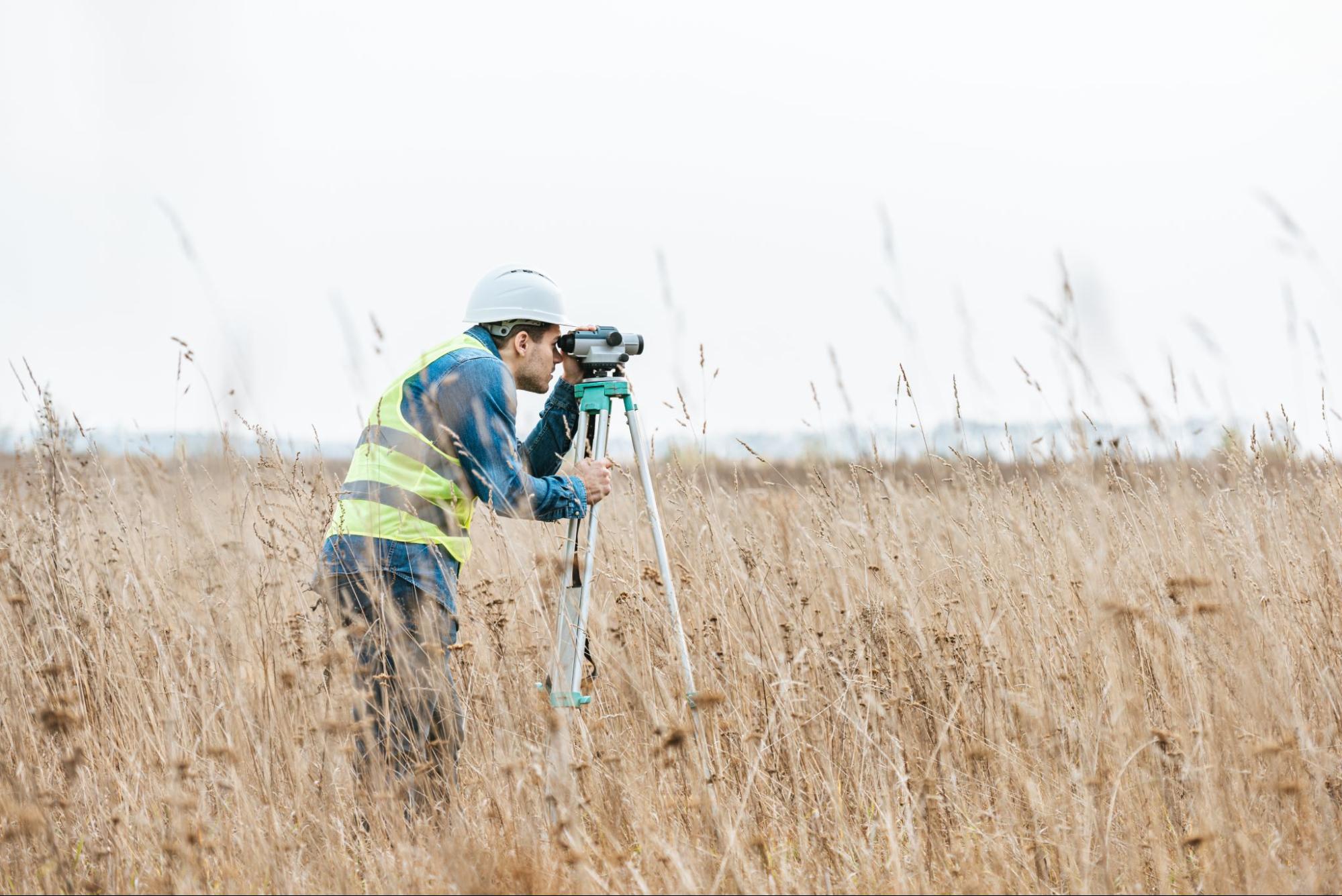 man providing professional land surveying services