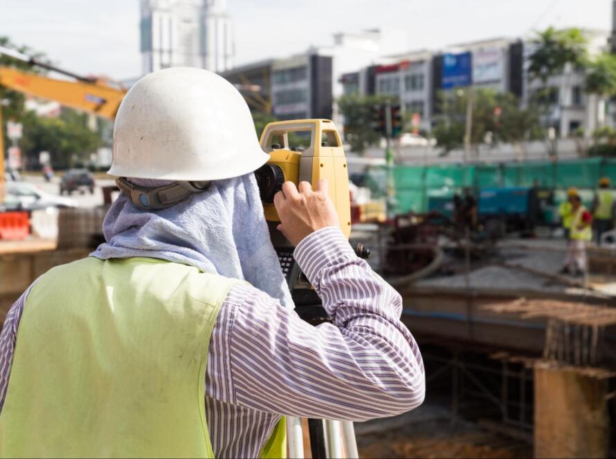 professional and licensed land surveyor at work