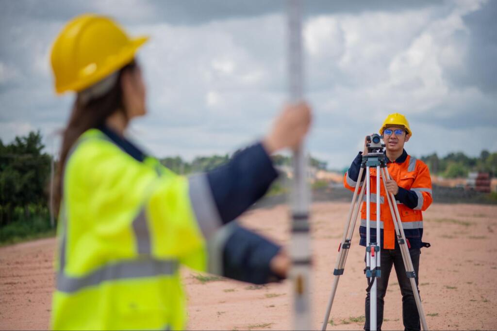 professional land surveyors at work, representing the responsibility and role of a land surveyor in Rio Grande City TX