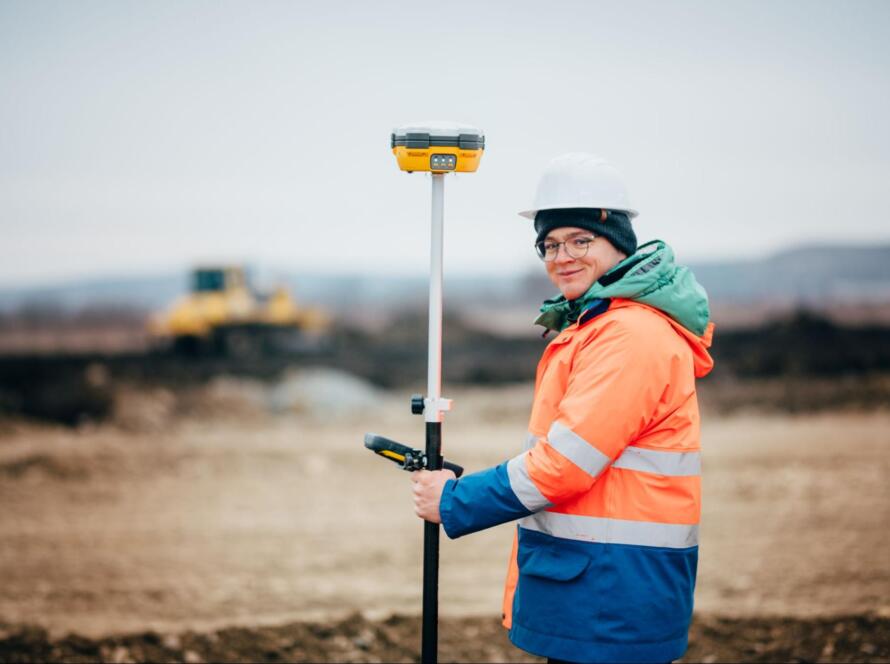 Surveyor using GPS equipment, representing Southpoint Geodetics Services