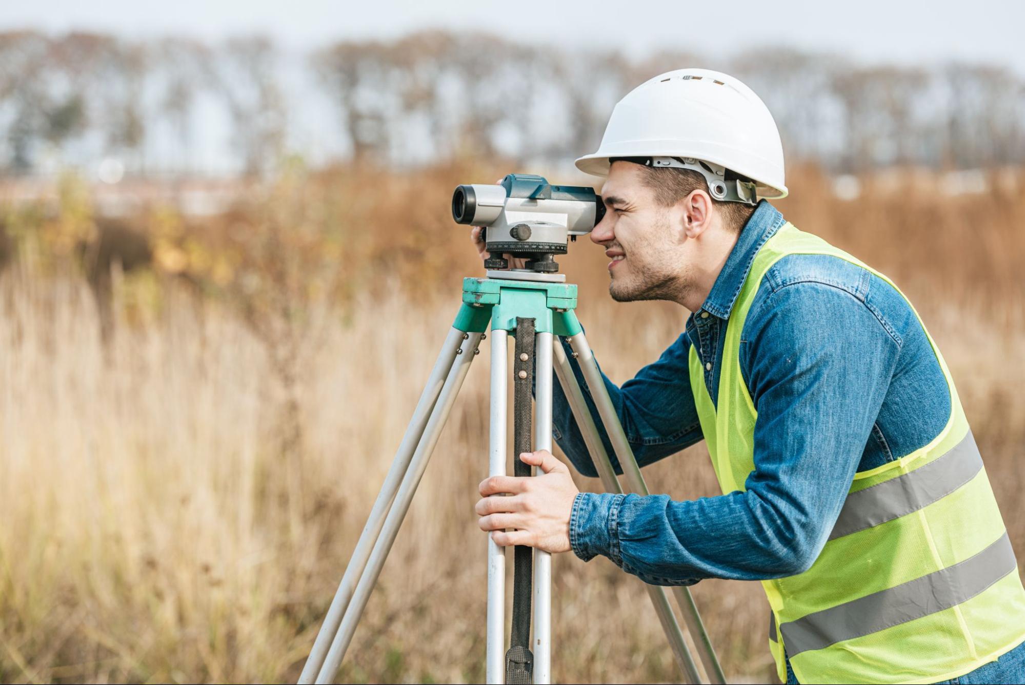 land surveying professional at work