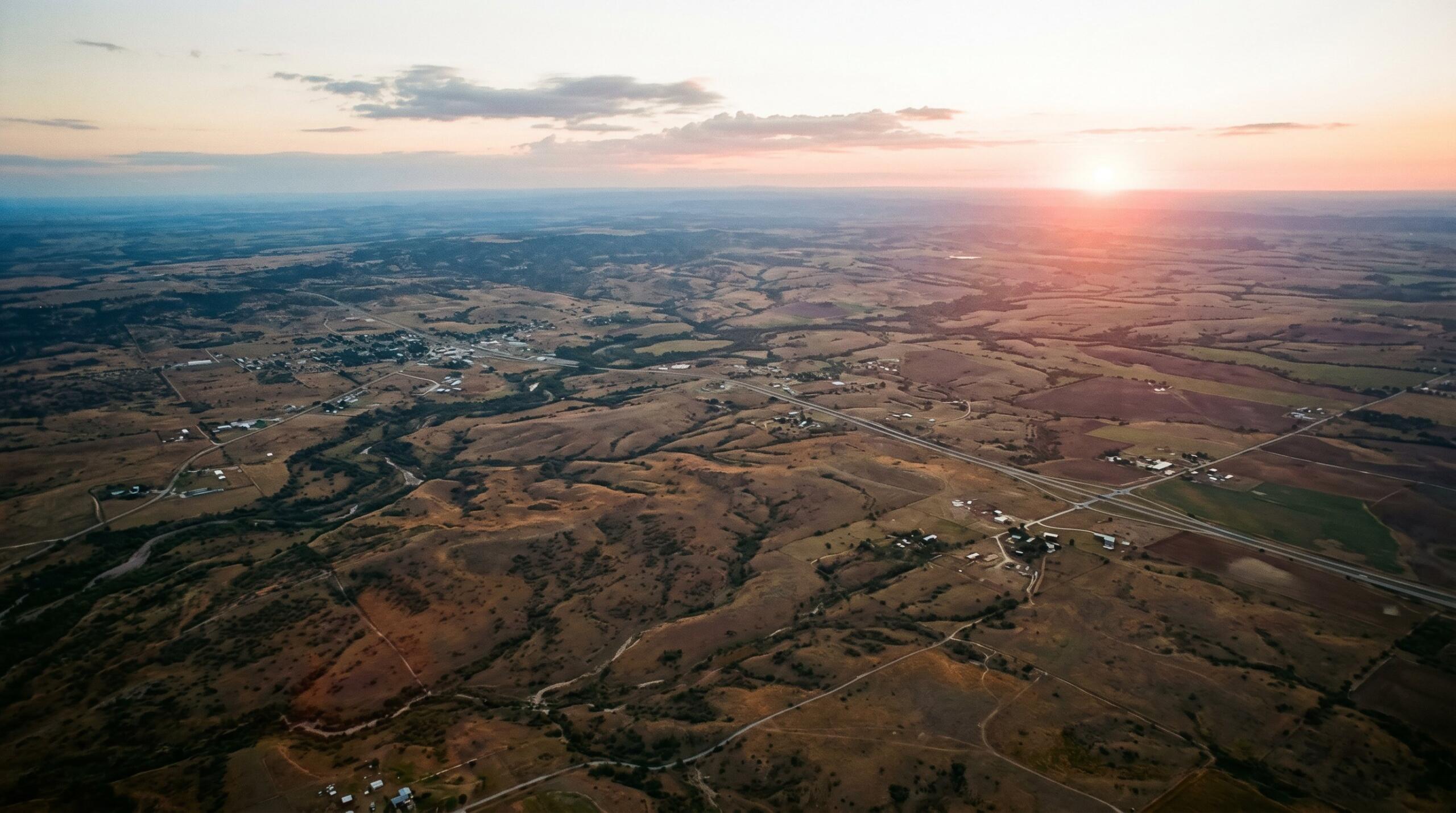 aerial view of land, representing the question: Do I Need a Land Surveyor to Buy Land?