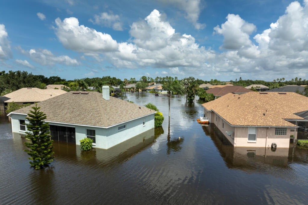 flooded homes in a suburban neighborhood