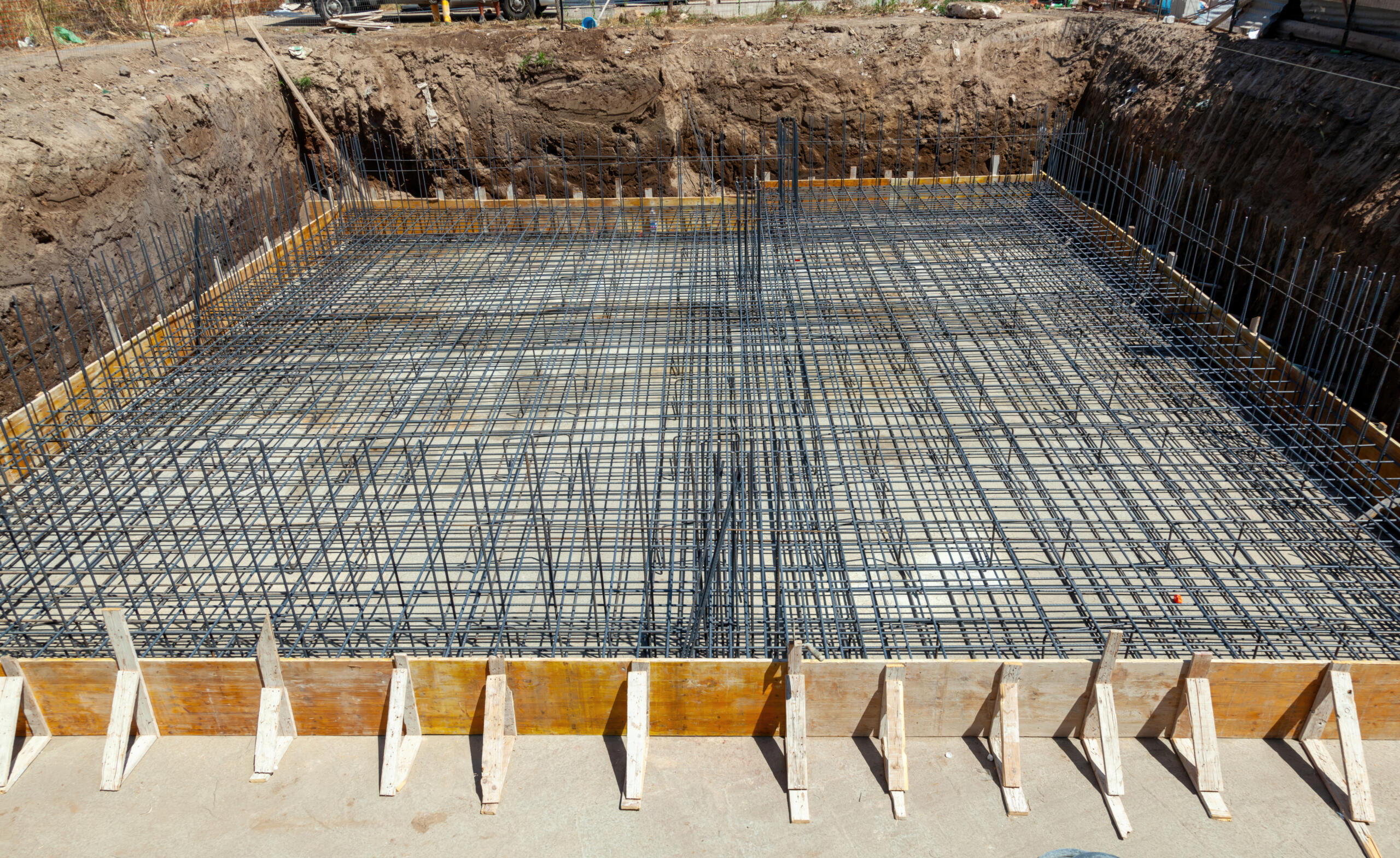 reinforcement steel foundation for construction, representing the importance of construction staking near me