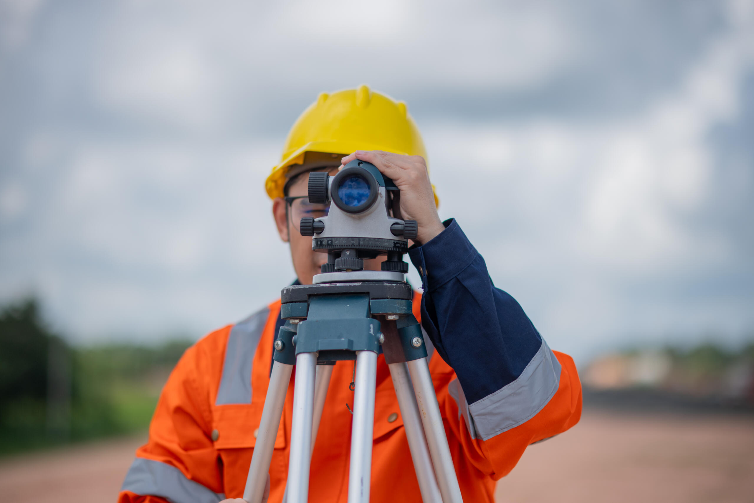 land surveying professional at work