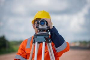 land surveyor at work symbolizing Land Survey Services in Raymondville, TX