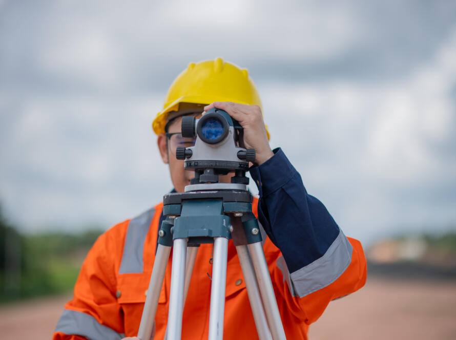 land surveyor at work symbolizing Land Survey Services in Raymondville, TX