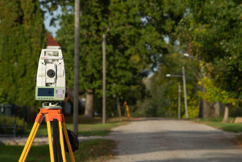 theodolite representing the curiosity behind the question “Do I Need Land Surveying Services to Buy Property in Texas?”