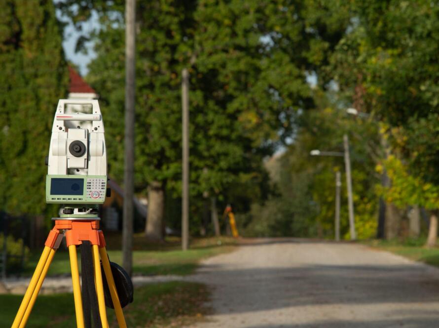 theodolite representing the curiosity behind the question “Do I Need Land Surveying Services to Buy Property in Texas?”
