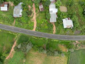 Aerial view of rural land, roads, and developed properties